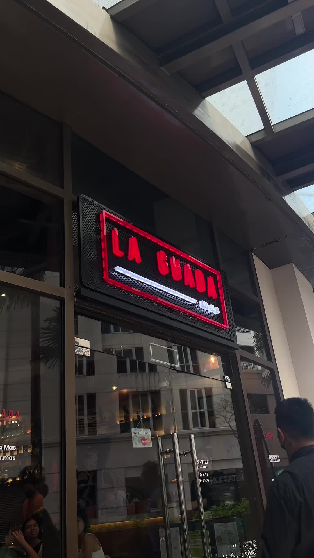 La Guada Mas storefront and neon signage at Joya Lofts, Rockwell